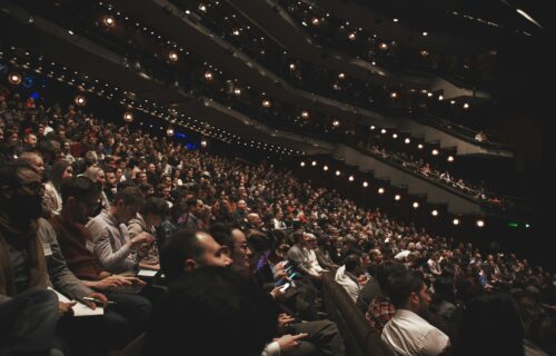 Large Confernce Crowd Of Sponsors And Attenddees